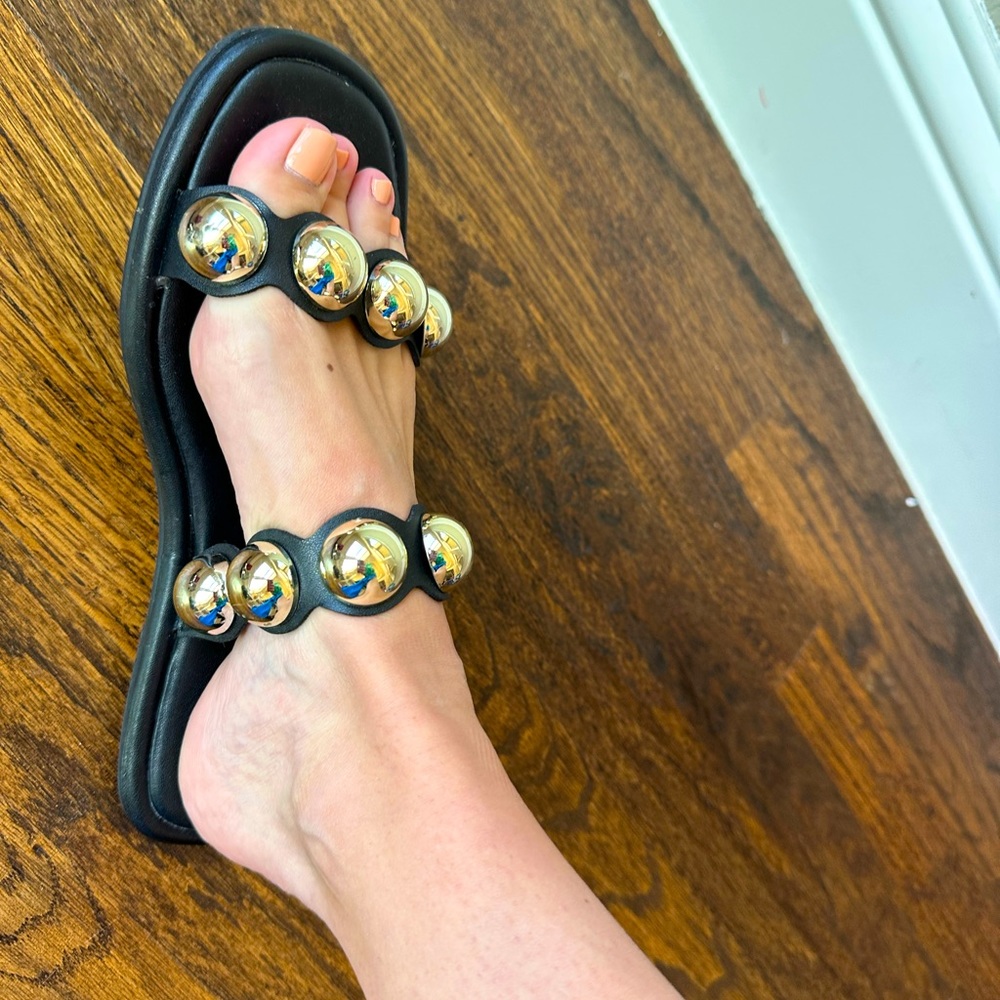 Black and gold flats!